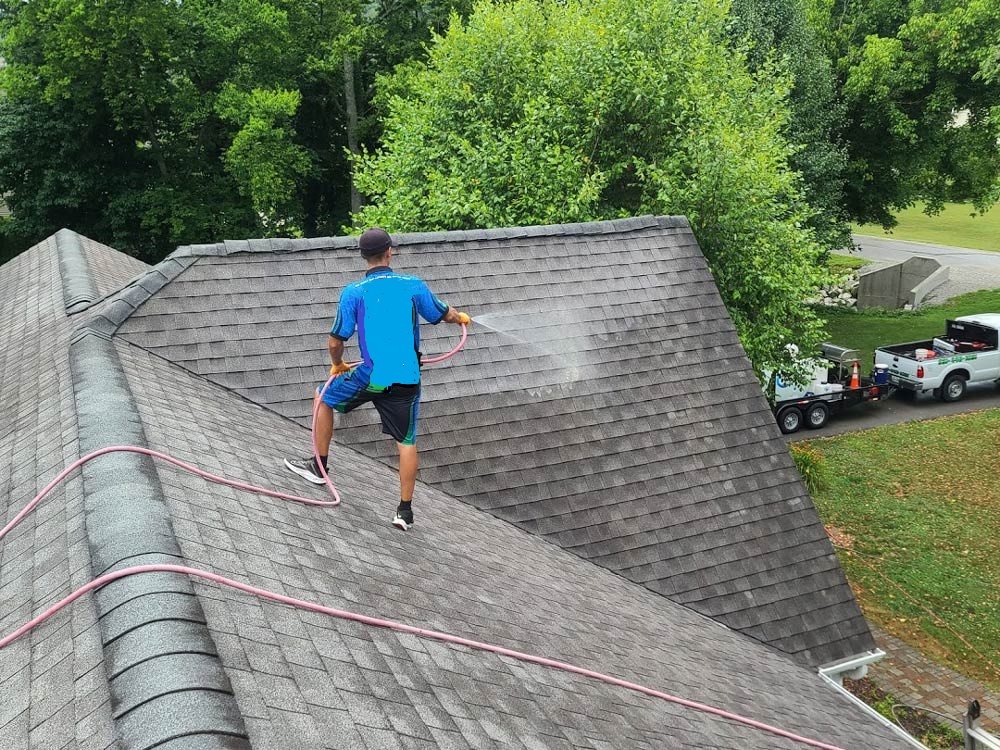15cent-Employee-Washing-Roof